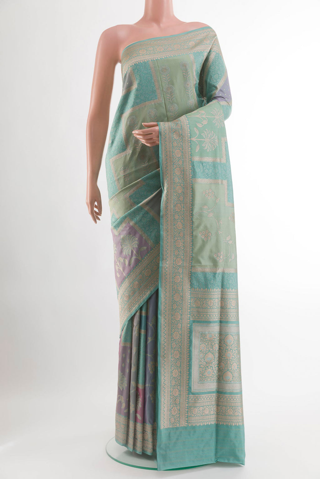 Multi Color Banarasi Silk Saree with Zari Brocade on the body and Zari Border.  displayed on a mannequin