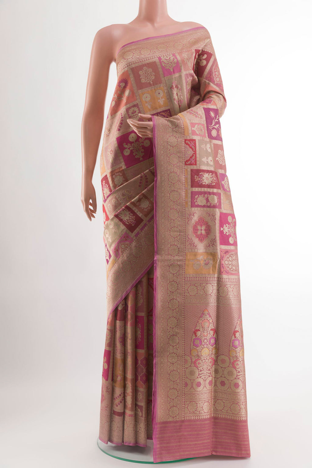 Rose Gold Banarasi Silk Saree with Zari Brocade on the body and Zari Border.  displayed on a mannequin