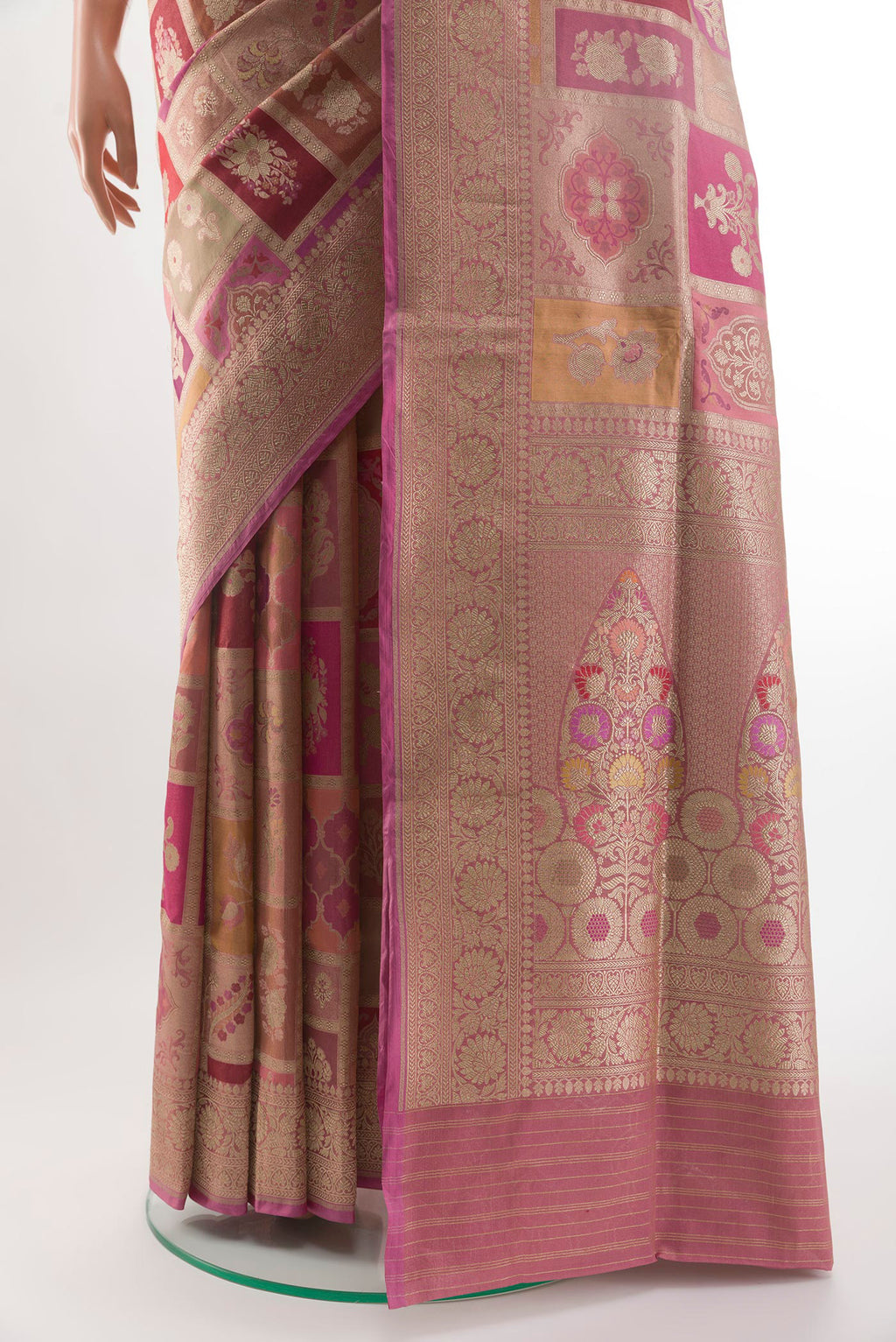 Pleats and pallu of Rose Gold Banarasi Silk Saree with Zari Brocade on the body and Zari Border. 