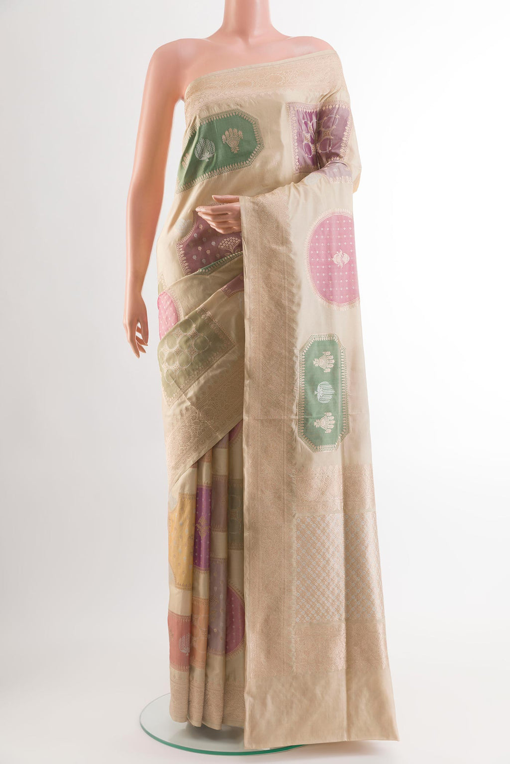 Beige Banarasi Silk Saree with Zari Brocade on the body and Zari Border.  displayed on a mannequin