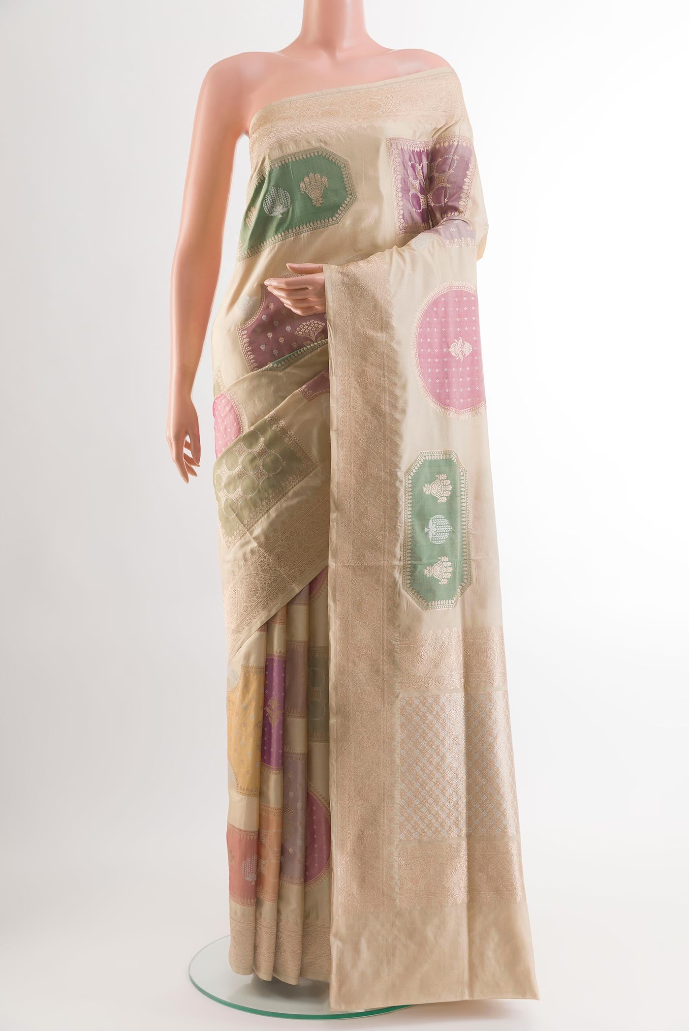 Beige Banarasi Silk Saree with Zari Brocade on the body and Zari Border.  displayed on a mannequin