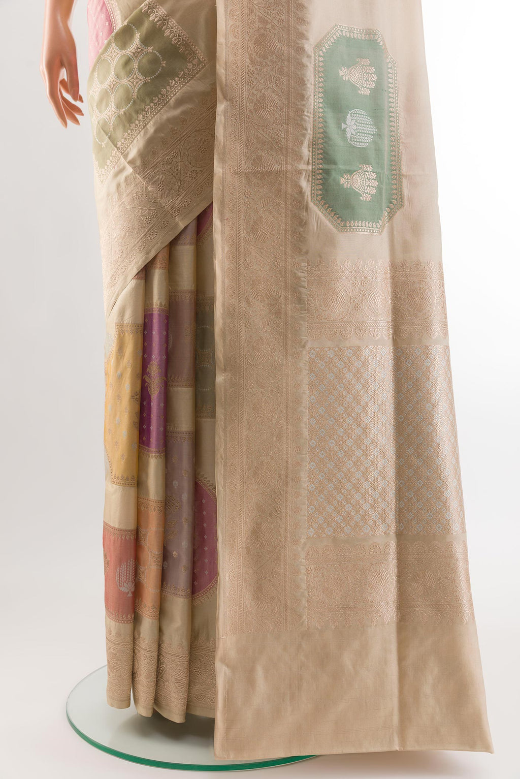 Pleats and pallu of Beige Banarasi Silk Saree with Zari Brocade on the body and Zari Border. 