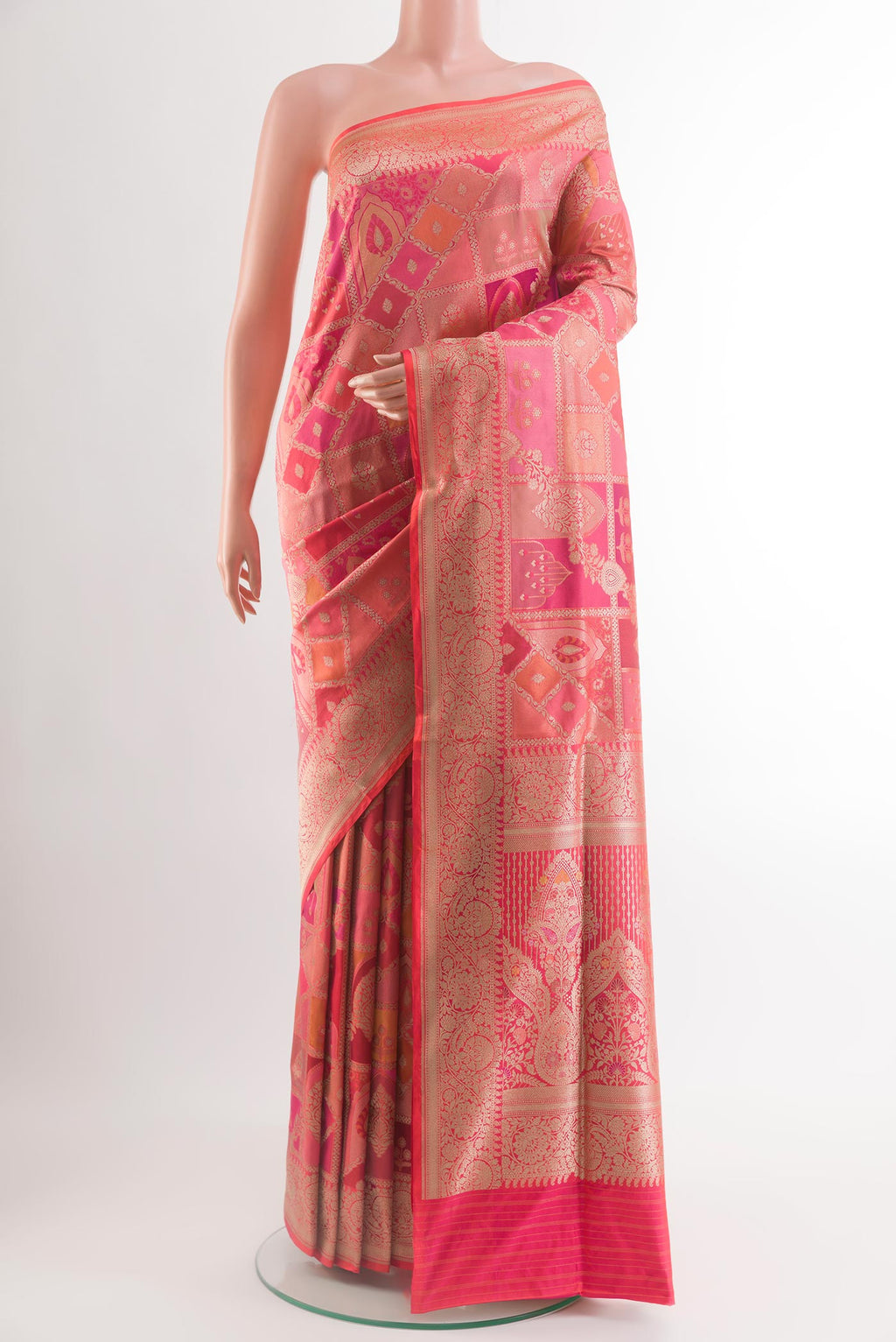 Coral Banarasi Silk Saree with Zari Brocade on the body and Zari Border.  displayed on a mannequin
