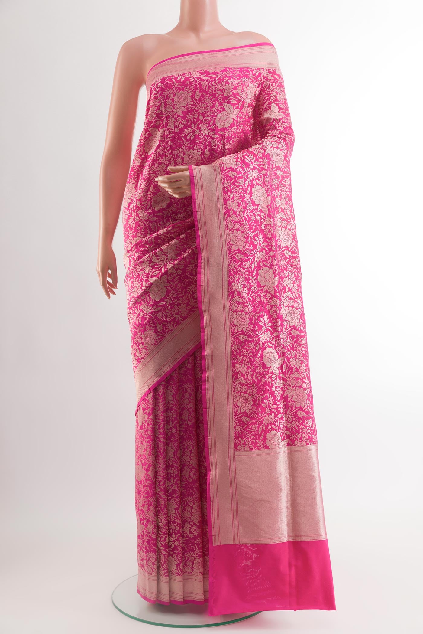 Pink Banarasi Silk Saree with Zari Brocade on the body and Zari Border.  displayed on a mannequin