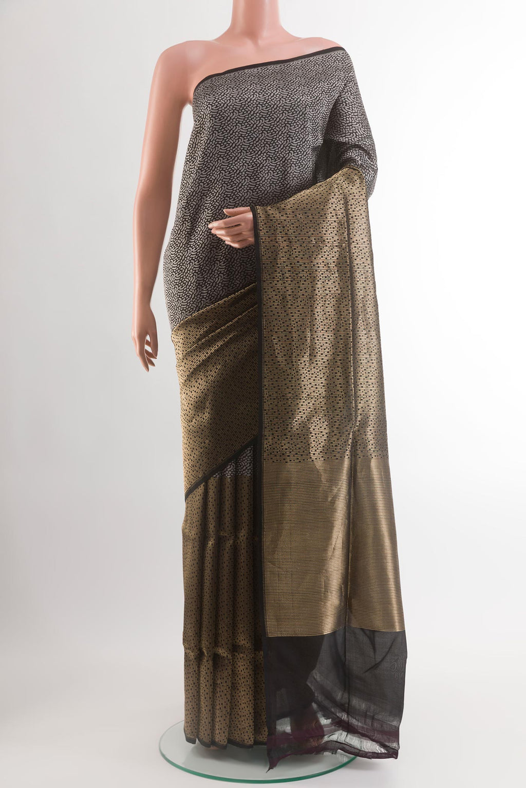 Black Banarasi Silk Saree with Zari Brocade on the body and Without Border.  displayed on a mannequin