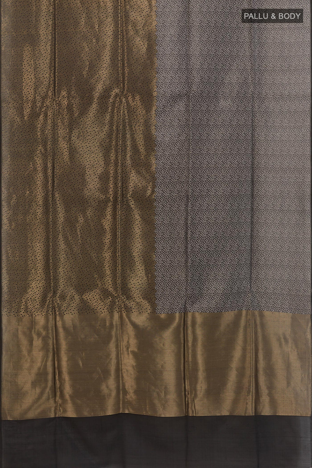 Flat view of Black Banarasi Silk Saree with Zari Brocade on the body and Without Border. 
