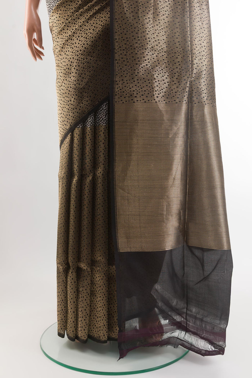 Pleats and pallu of Black Banarasi Silk Saree with Zari Brocade on the body and Without Border. 