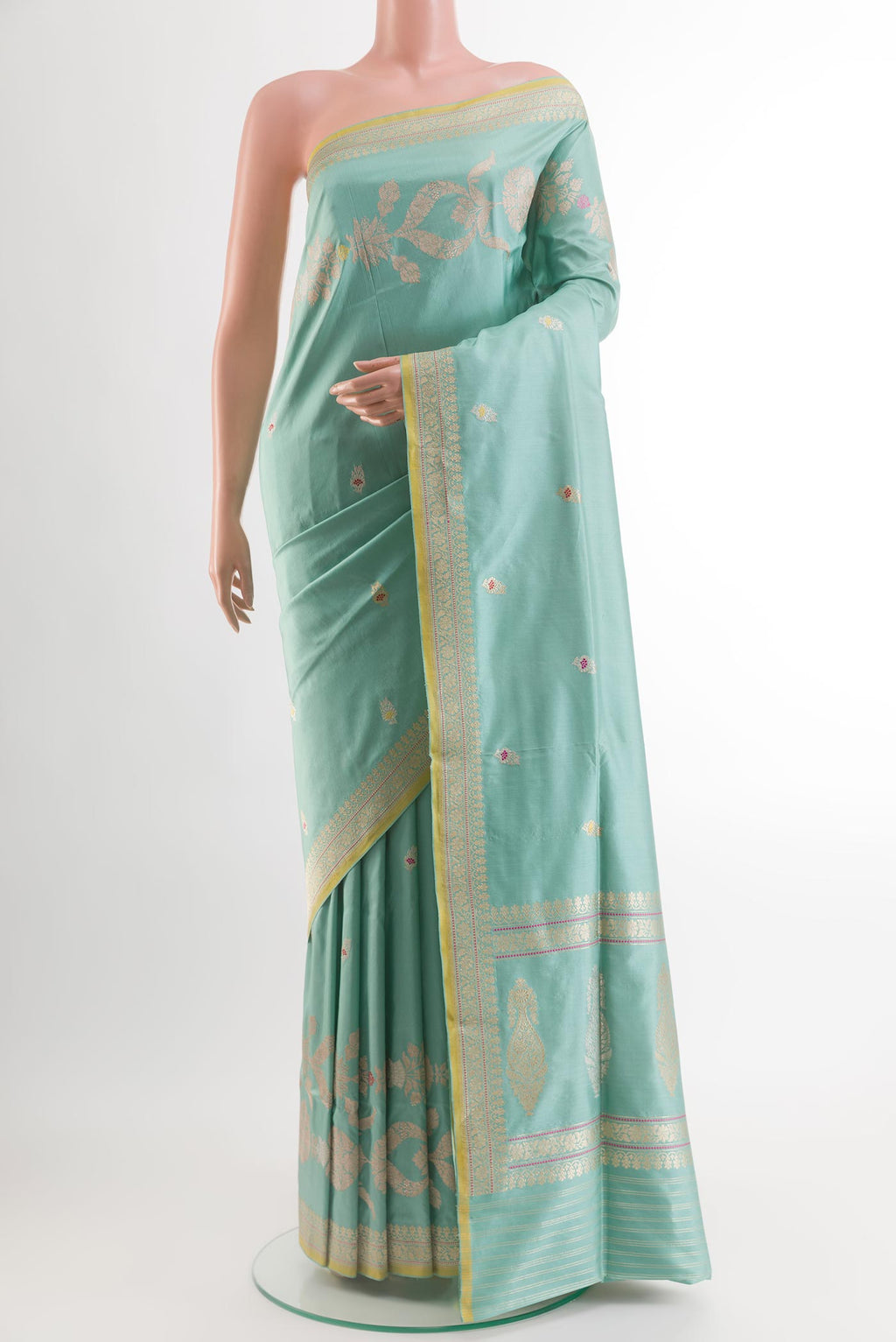 Light Blue Banarasi Silk Saree with Zari Butta on the body and Zari Border.  displayed on a mannequin