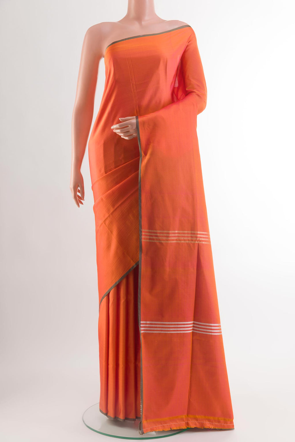 Orange Banarasi Silk Saree with Plain Body and Zari Border.  displayed on a mannequin
