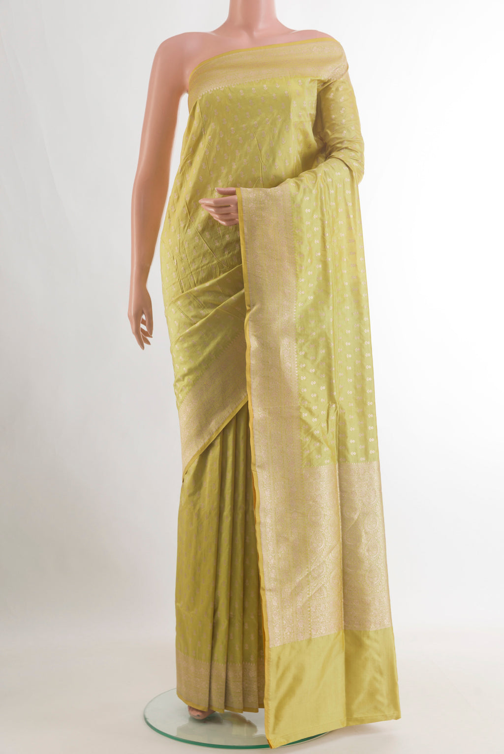 Pure Silk Yellow Banarasi Saree with Zari Brocade on the body and Zari Border.  displayed on a mannequin