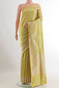 Pure Silk Yellow Banarasi Saree with Zari Brocade on the body and Zari Border.  displayed on a mannequin