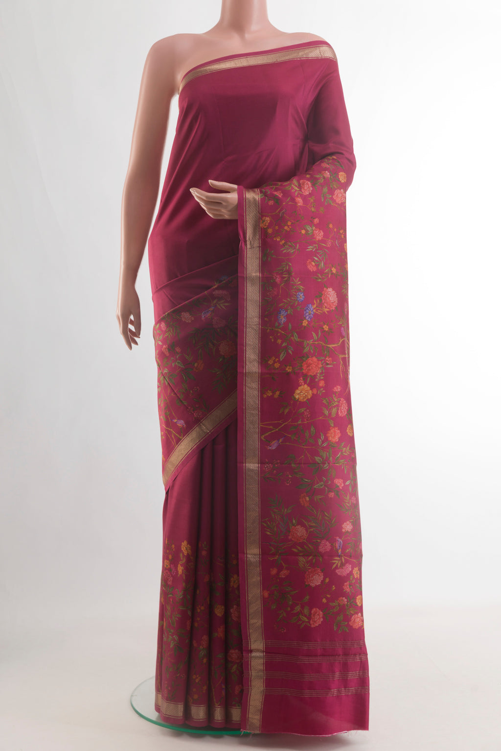 Dark Pink Printed Silk Saree with Plain Body and Zari Border.  displayed on a mannequin