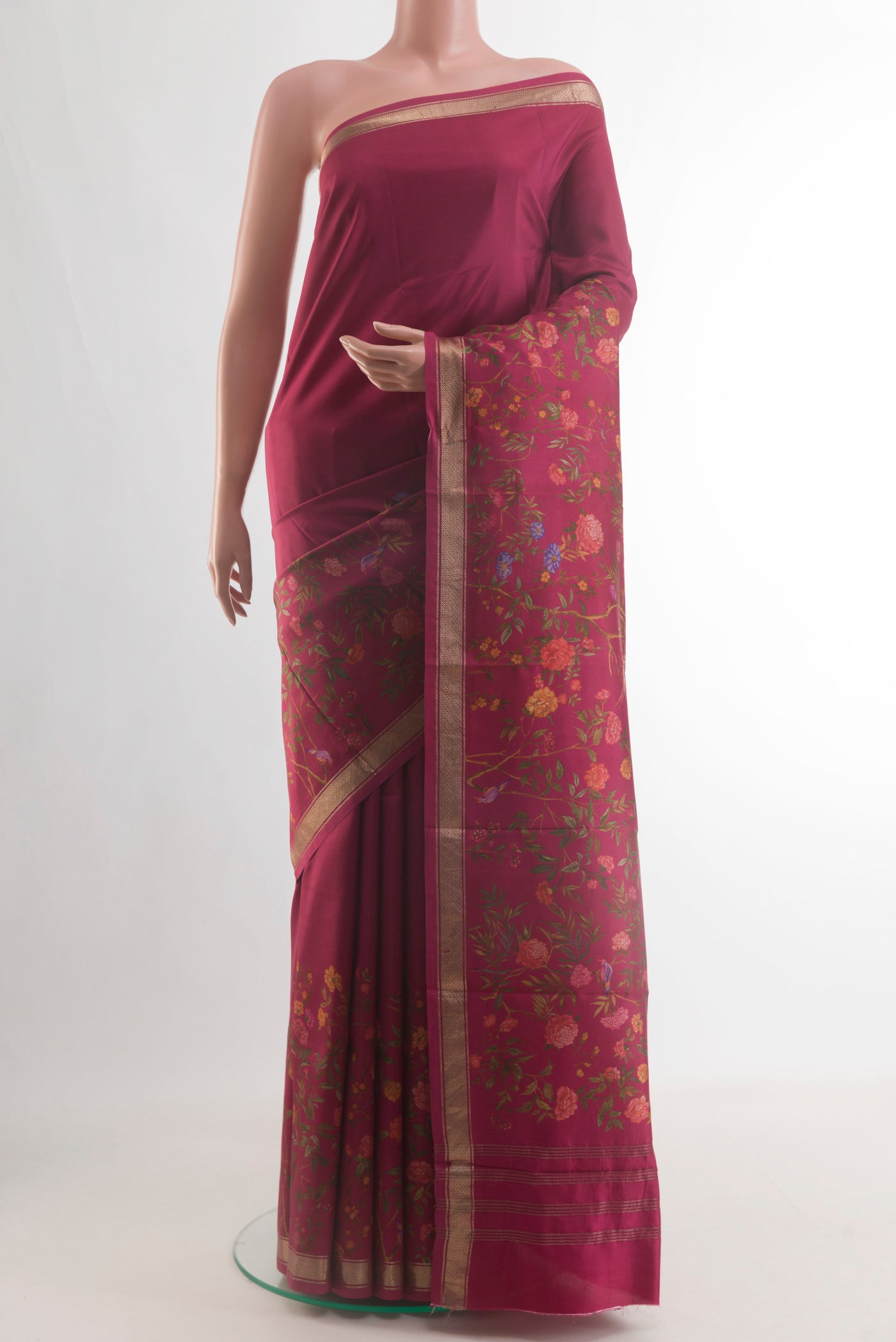 Dark Pink Printed Silk Saree with Plain Body and Zari Border.  displayed on a mannequin