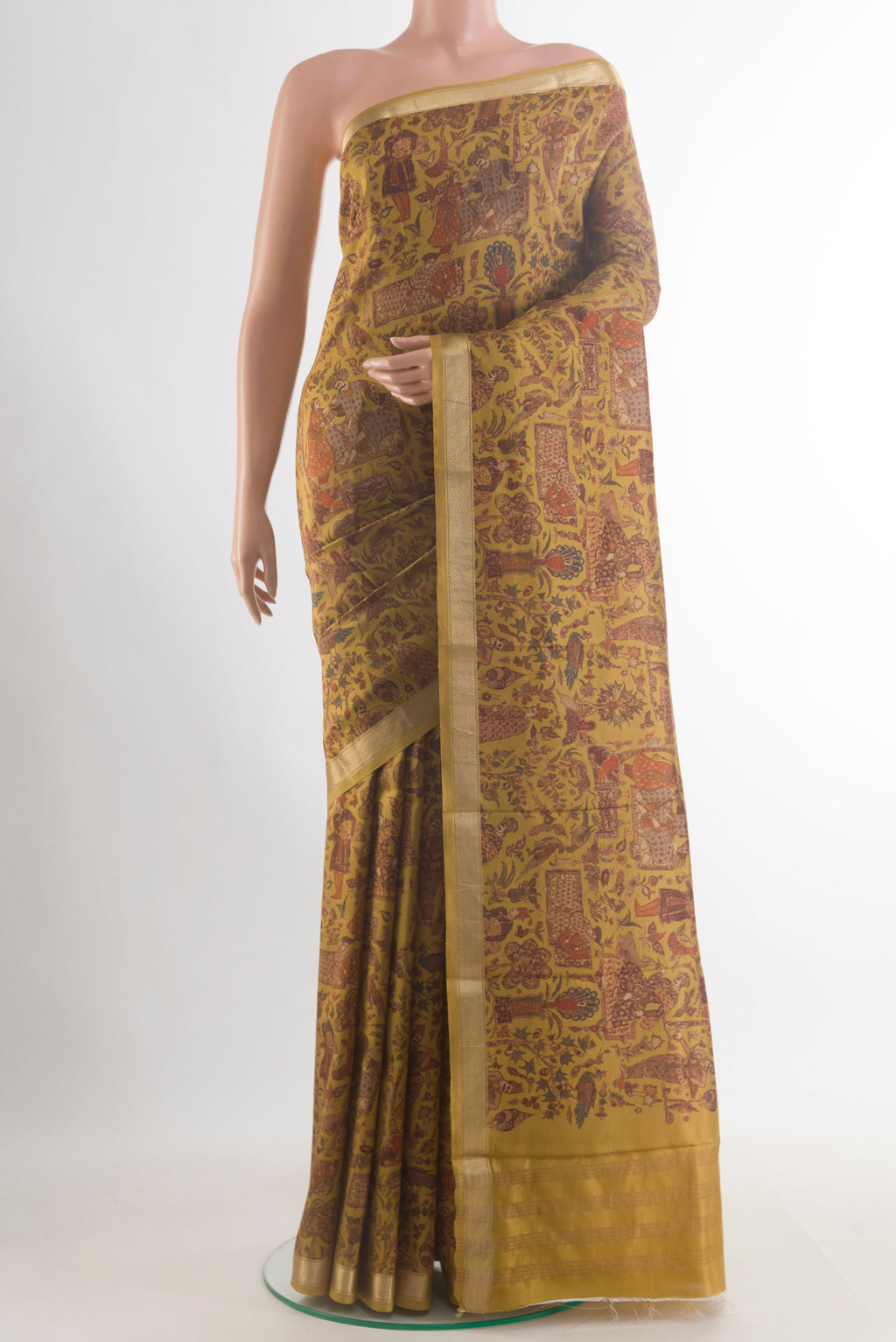 Pure Silk Mustard Printed Saree with Printed design on the body and Zari Border.  displayed on a mannequin
