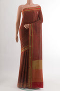 Brown Crepe Saree with Printed design on the body and Zari Border.  displayed on a mannequin