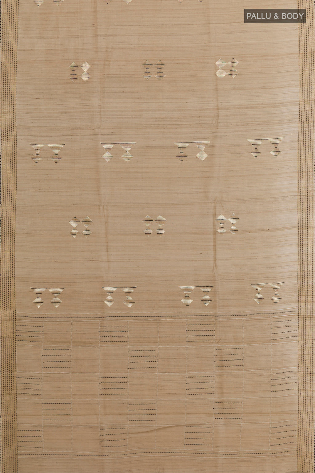 Flat view of Beige Tussar Silk Saree with Embroidery on the body and Embroidery Border. 