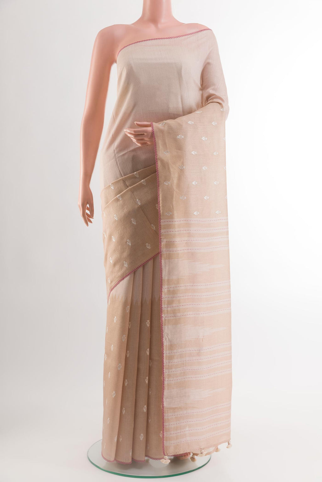 Beige Tussar Silk Saree with Half And Half on the body and Embroidery Border.  displayed on a mannequin