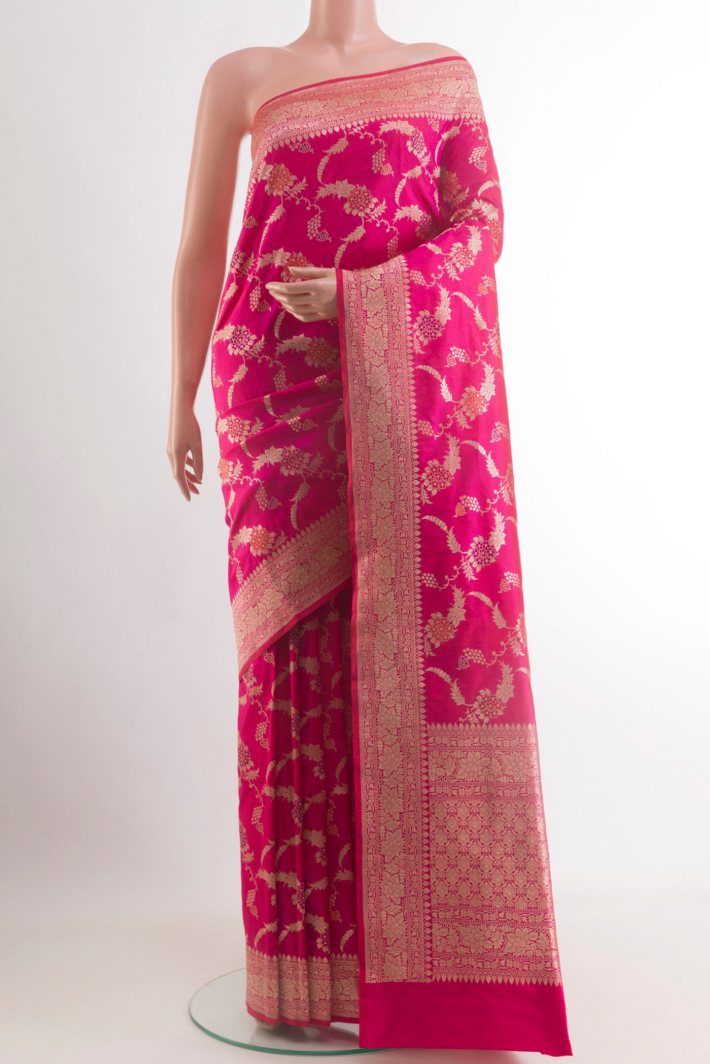 Pink Banarasi Silk Saree with Zari Brocade on the body and Zari Border.  displayed on a mannequin