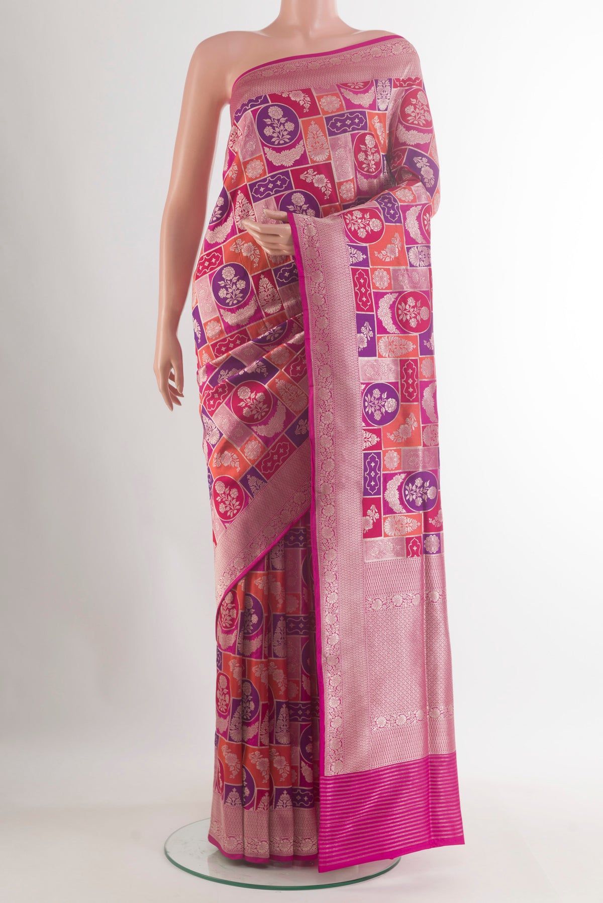 Pure Silk Multi Color Banarasi Saree with Zari Brocade on the body and Zari Border.  displayed on a mannequin