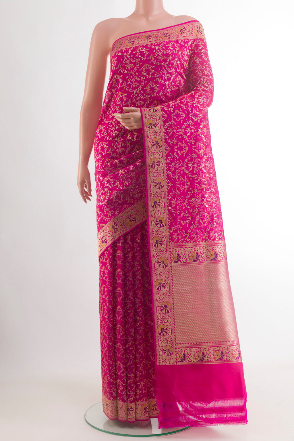 Rani Pink Banarasi Silk Saree with Zari Brocade on the body and Zari Border.  displayed on a mannequin