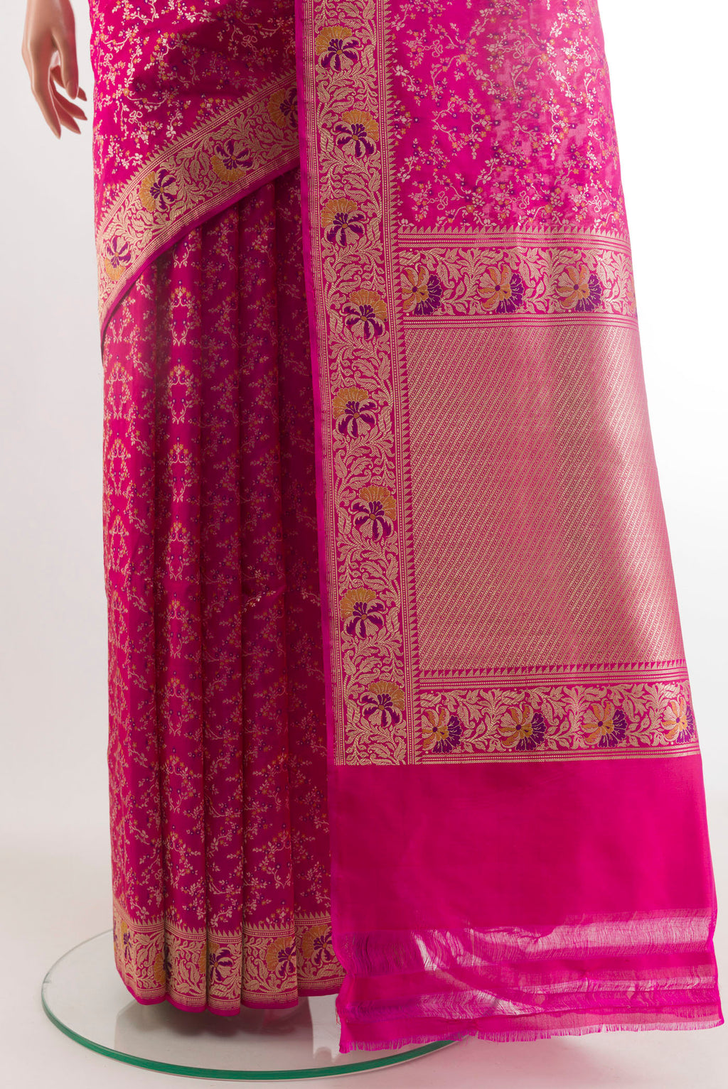 Pleats and pallu of Rani Pink Banarasi Silk Saree with Zari Brocade on the body and Zari Border. 