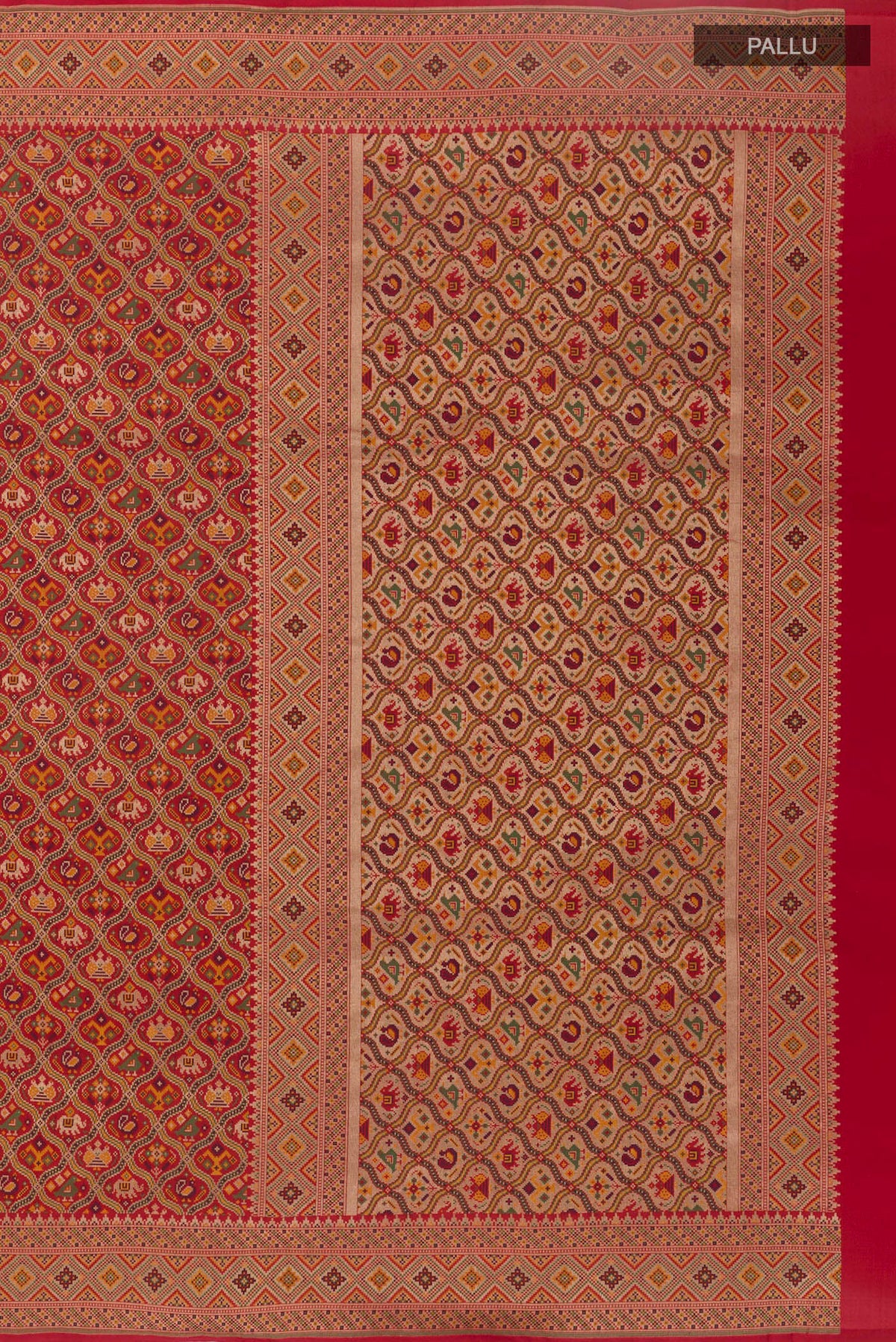 Close up image of the pallu of Red Banarasi Silk Saree with Jamdani on the body and Embroidery Border. 
