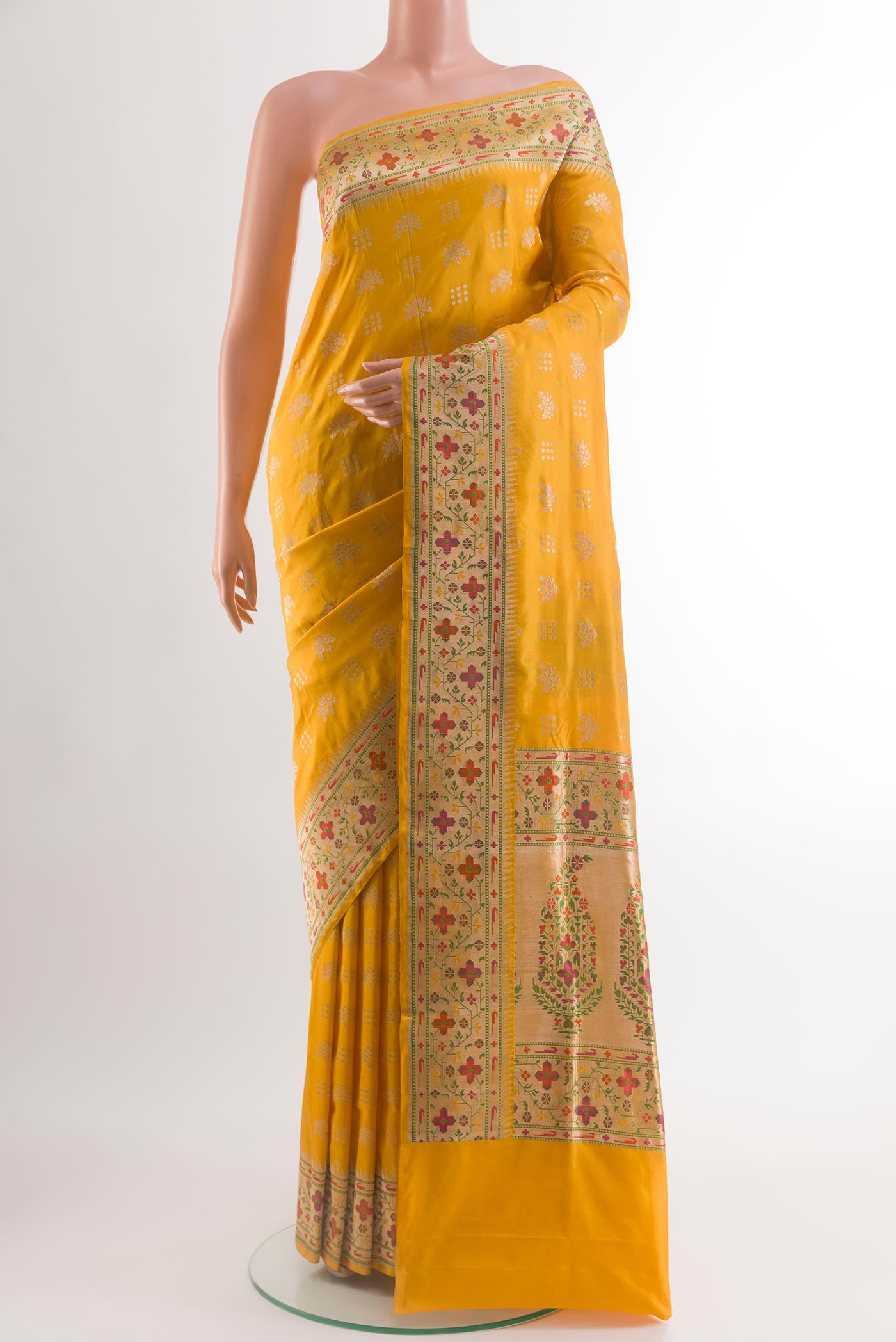 Yellow Banarasi Silk Saree with Zari Butta on the body and Paithani Border.  displayed on a mannequin
