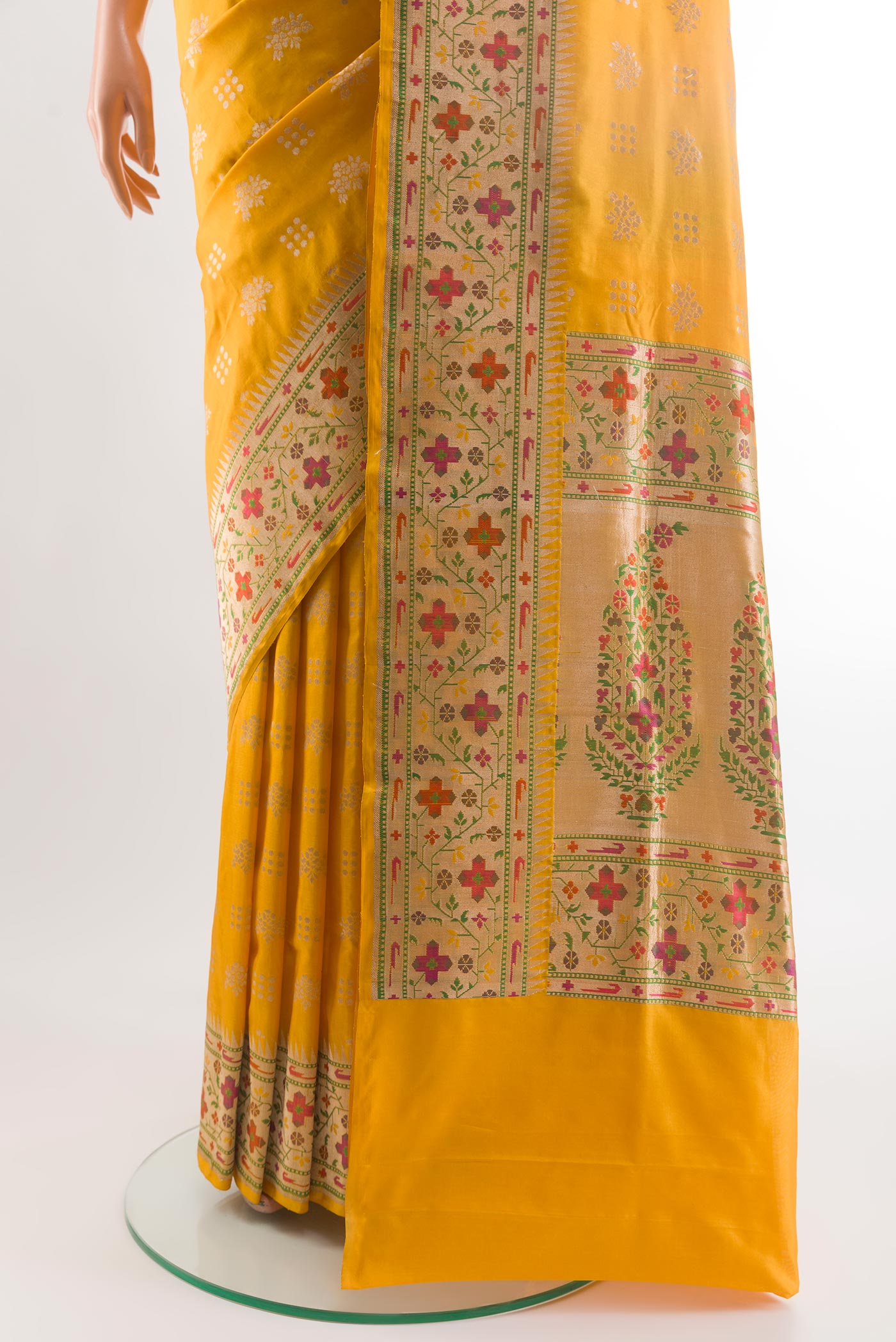 Pleats and pallu of Yellow Banarasi Silk Saree with Zari Butta on the body and Paithani Border. 