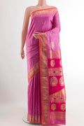 Lavender Paithani Silk Saree with Zari Butta on the body and Zari Border.  displayed on a mannequin