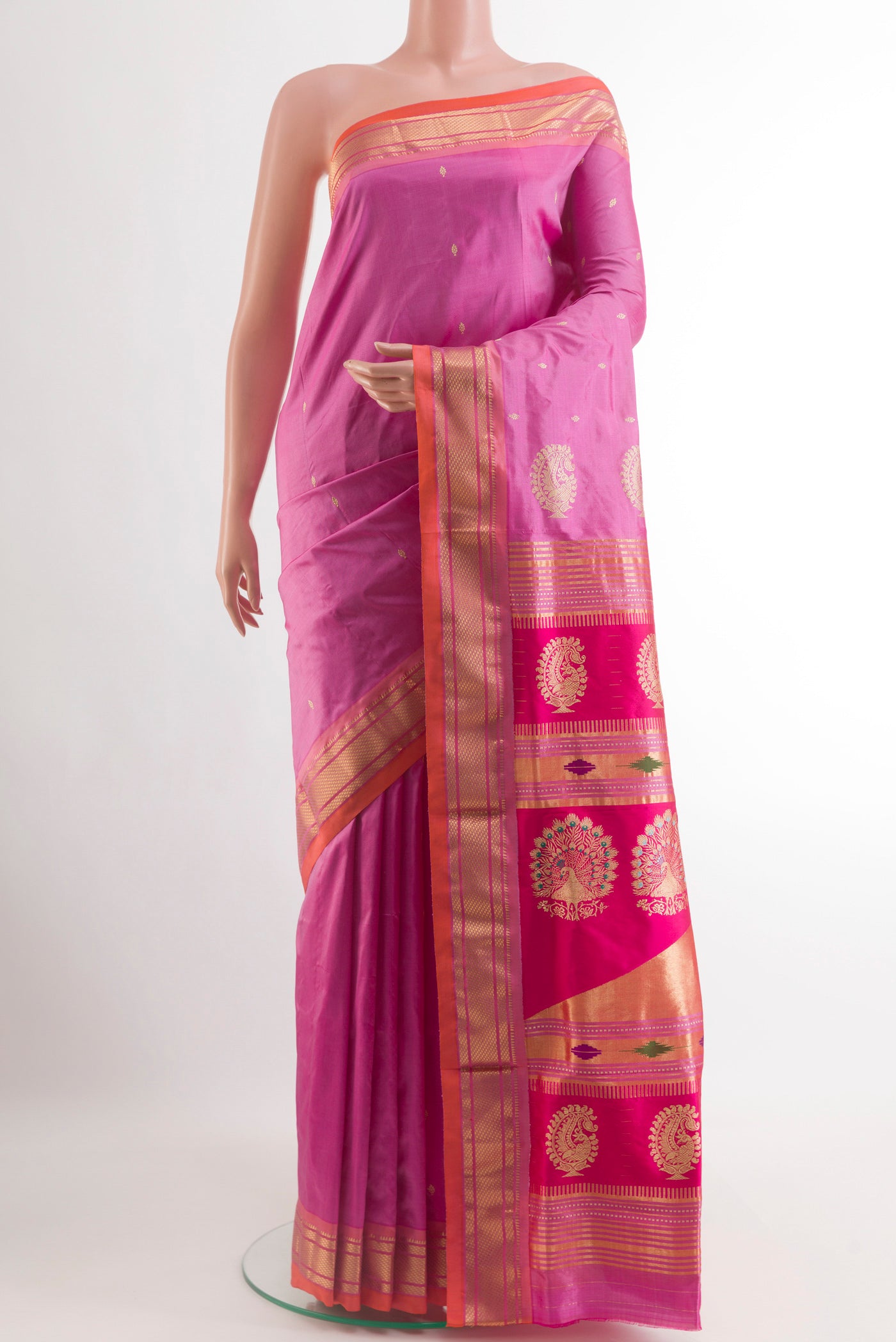 Lavender Paithani Silk Saree with Zari Butta on the body and Zari Border.  displayed on a mannequin