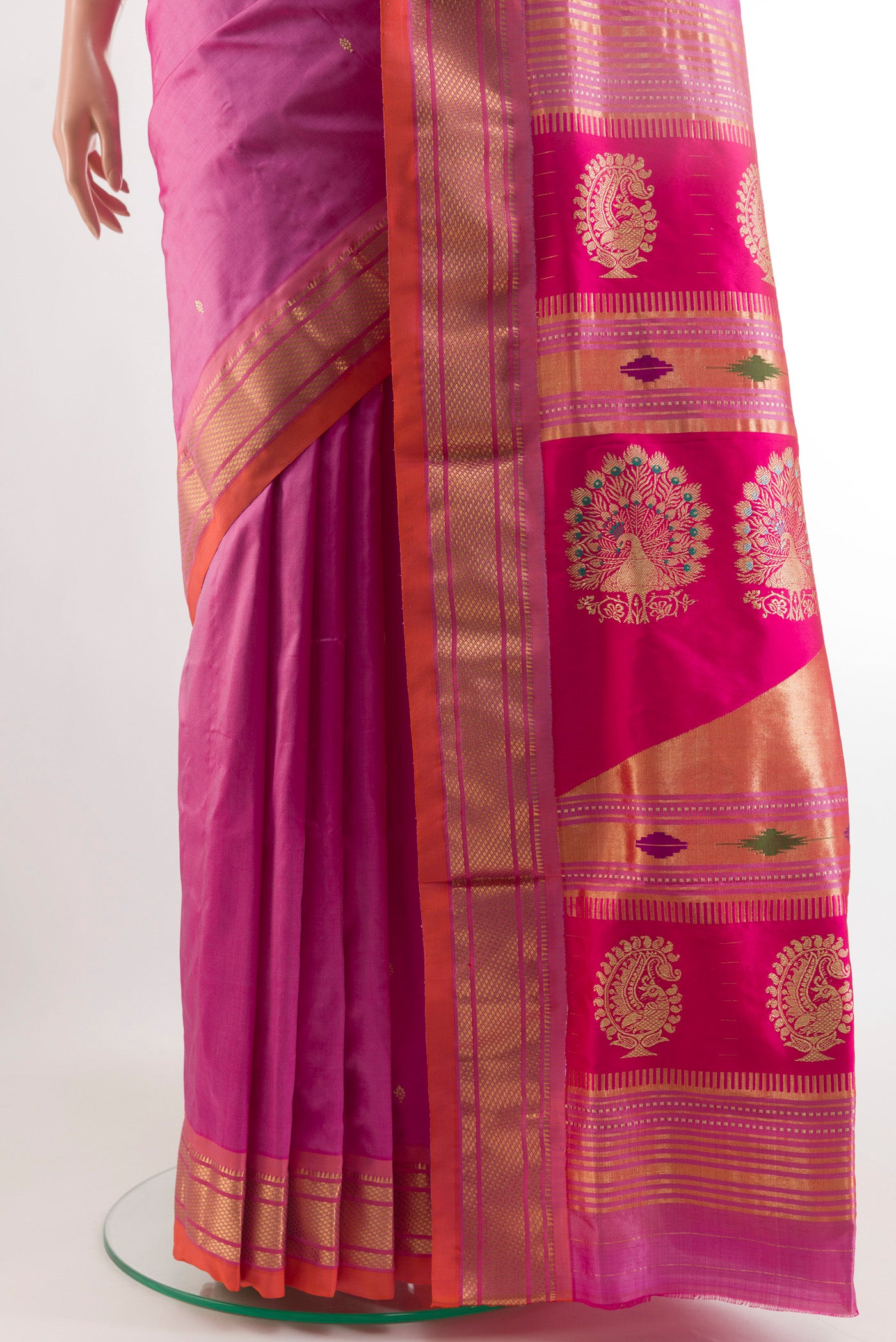 Pleats and pallu of Lavender Paithani Silk Saree with Zari Butta on the body and Zari Border. 
