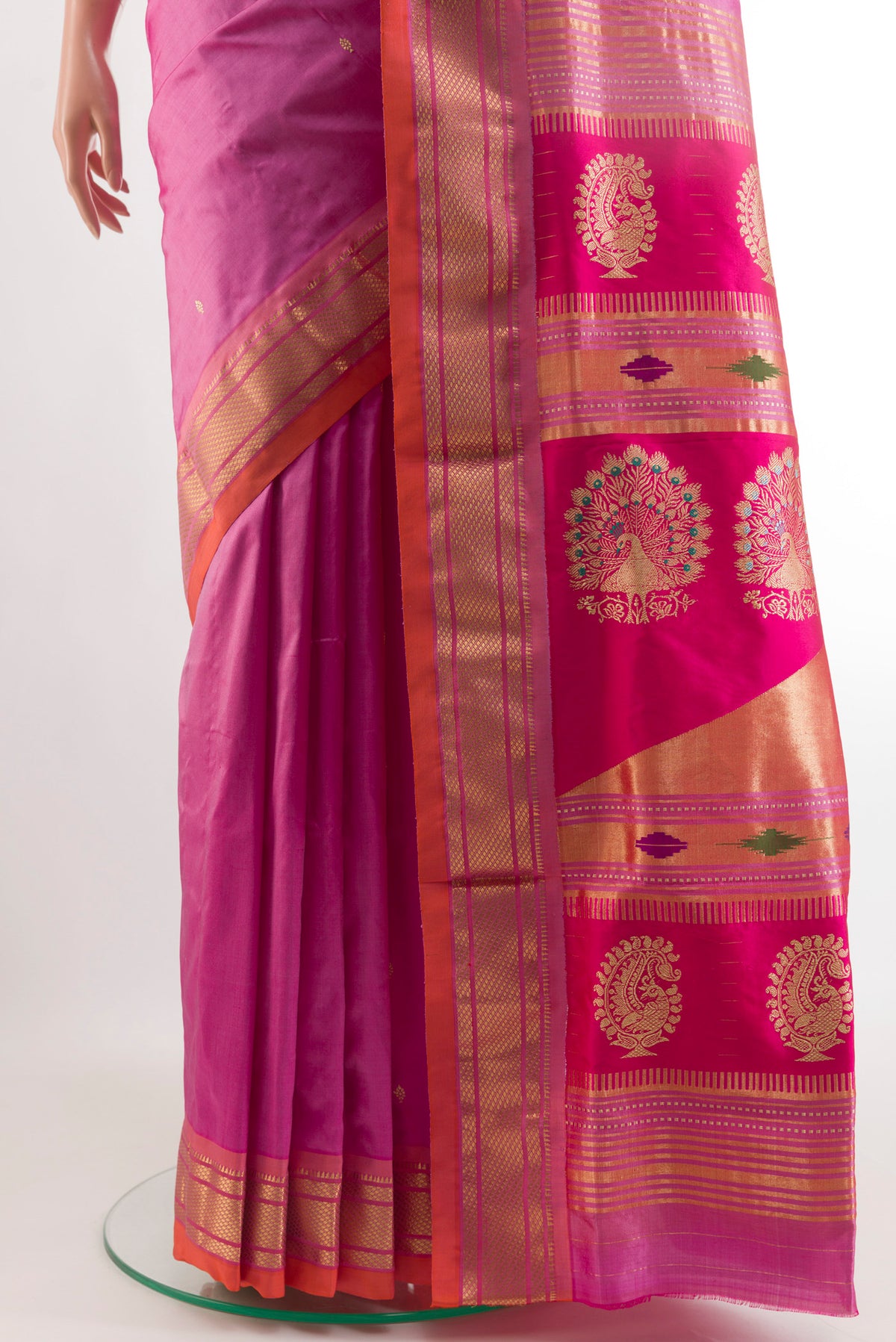 Pleats and pallu of Lavender Paithani Silk Saree with Zari Butta on the body and Zari Border. 
