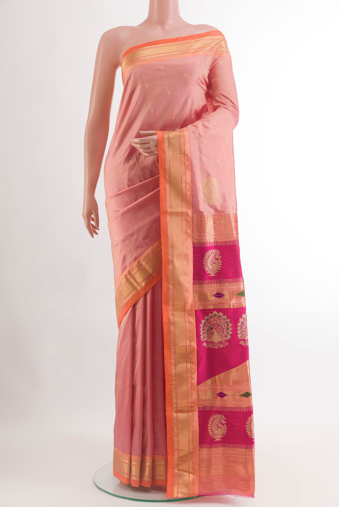 Rose Gold Paithani Silk Saree with Zari Butta on the body and Zari Border.  displayed on a mannequin
