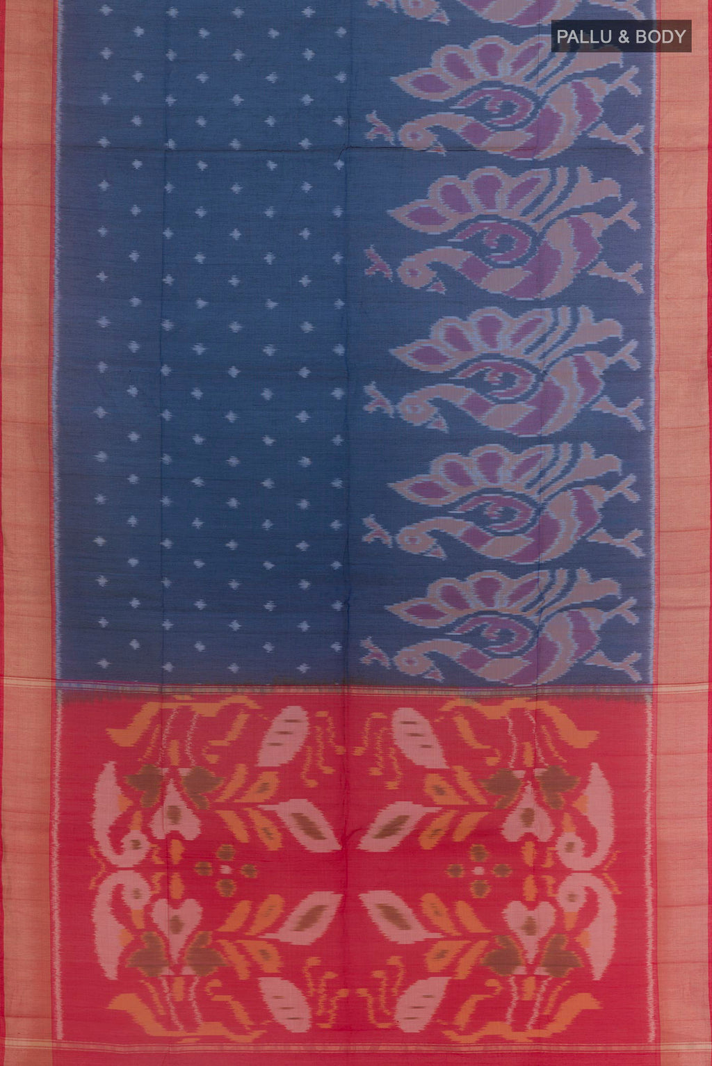Flat view of Blue Silk Cotton Saree with Ikat design on the body and Zari Border. 
