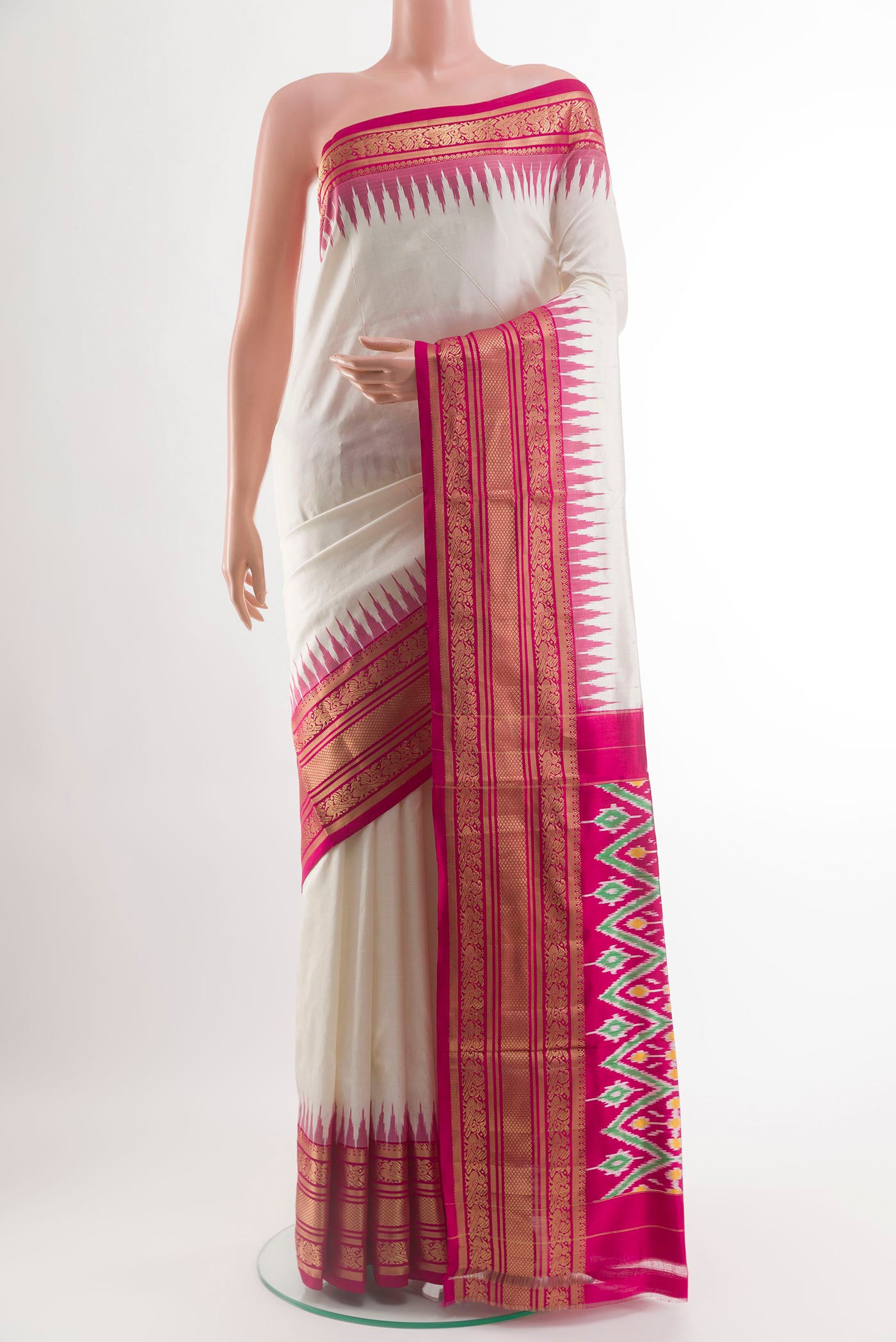 Off White Pochampally Silk Saree with Plain Body and Zari Border.  displayed on a mannequin