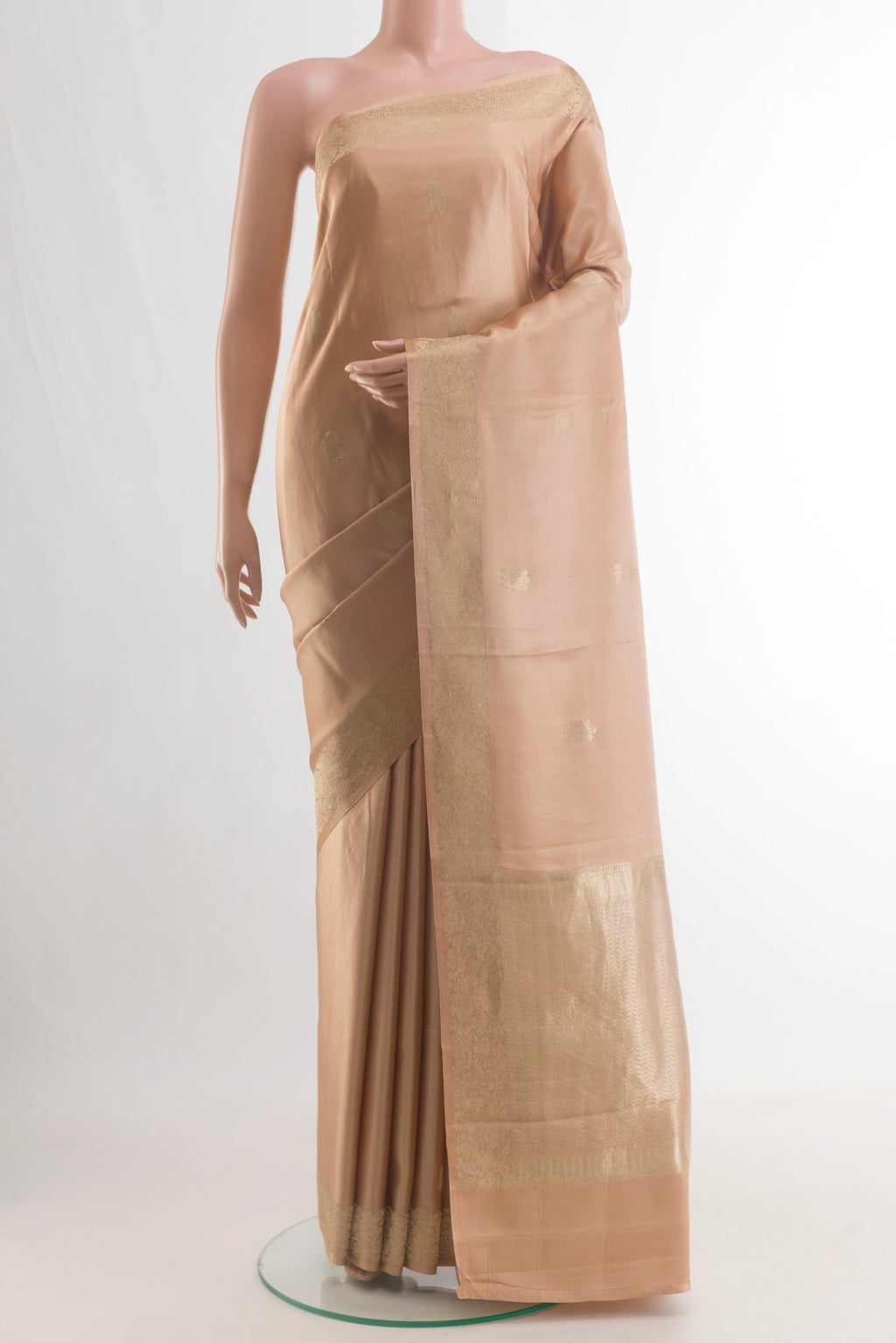 Pure Silk Sandal Banarasi Silk Saree with Zari Butta on the body and Zari Border.  displayed on a mannequin