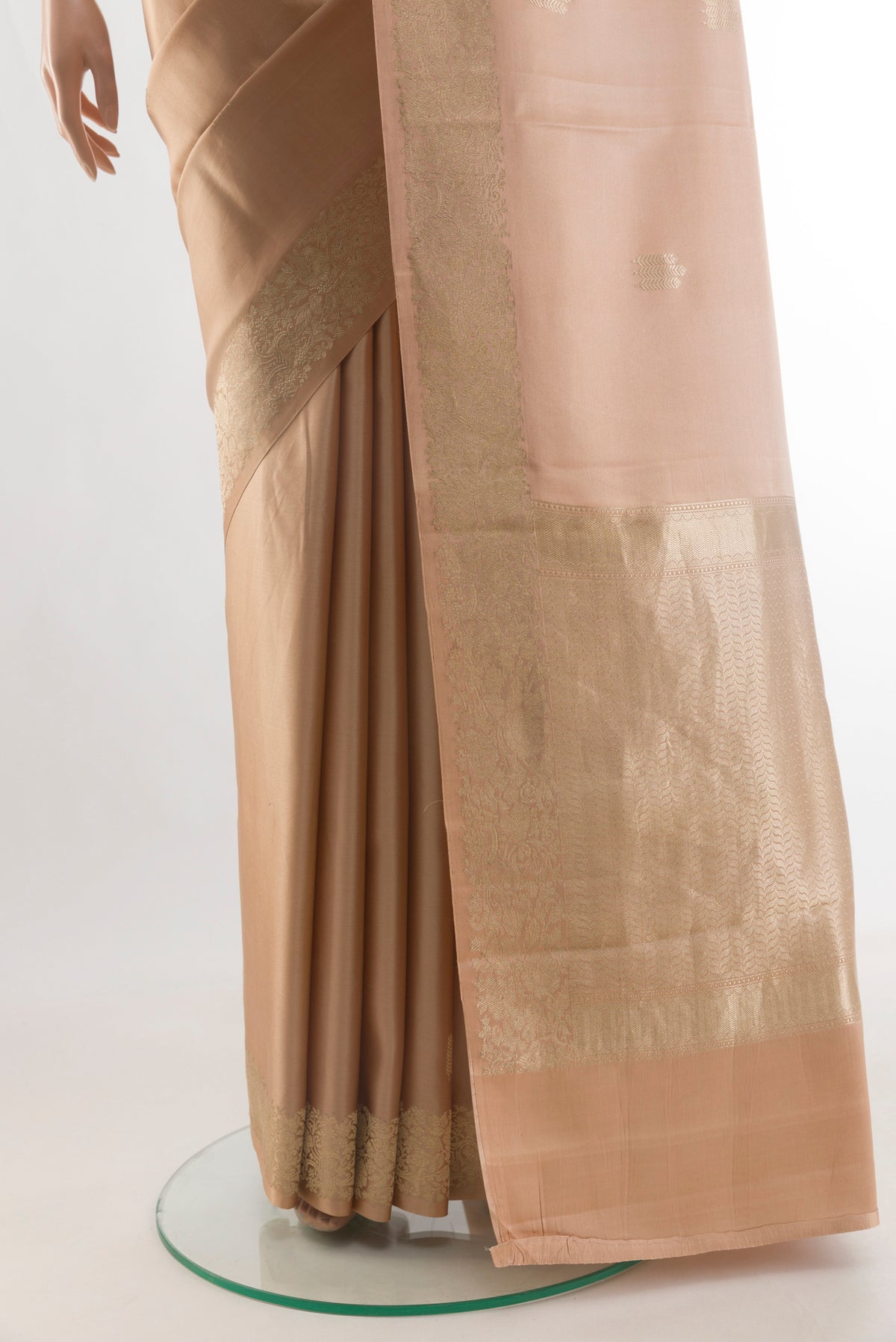 Pleats and pallu of Pure Silk Sandal Banarasi Silk Saree with Zari Butta on the body and Zari Border. 
