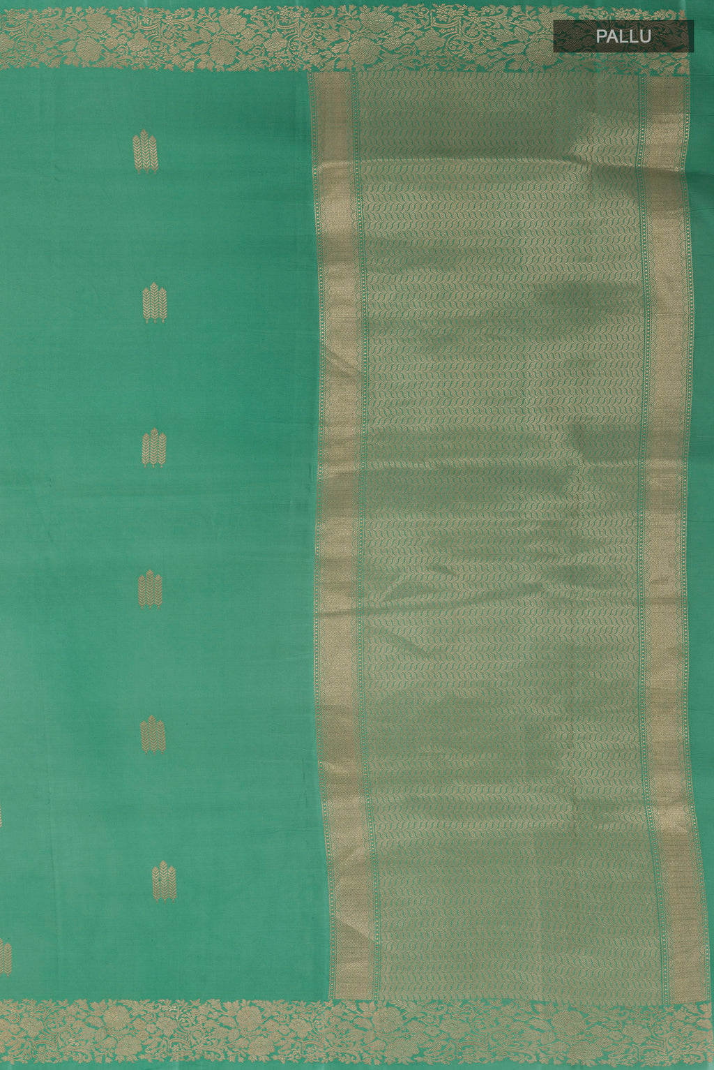 Close up image of the pallu of Sea Green Banarasi Silk Saree with Zari Butta on the body and Zari Border. 
