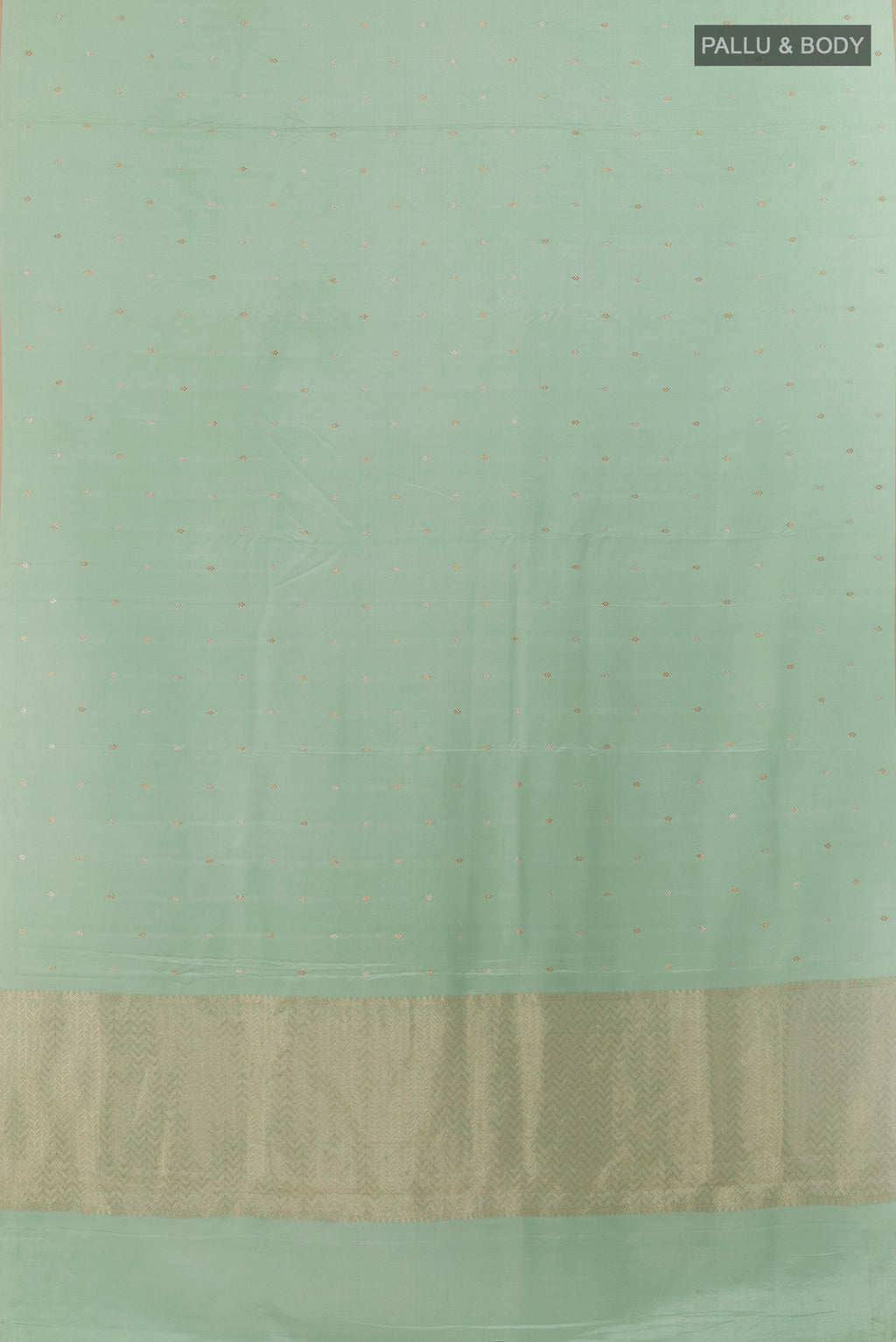Flat view of Mint Green Banarasi Silk Saree with Zari Butta on the body and Zari Border. 