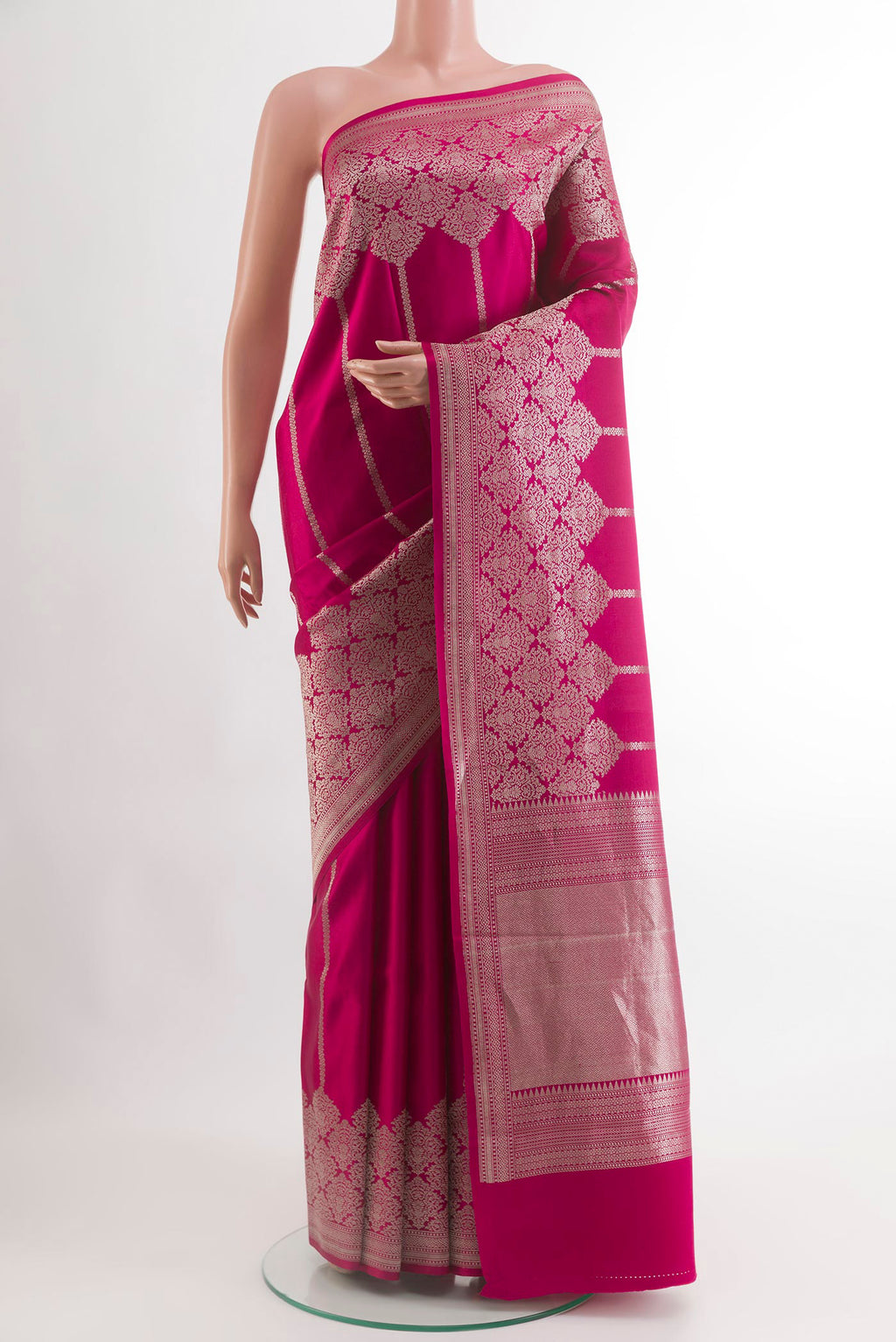 Rani Pink Banarasi Silk Saree with Stripes on the body and Zari Border.  displayed on a mannequin