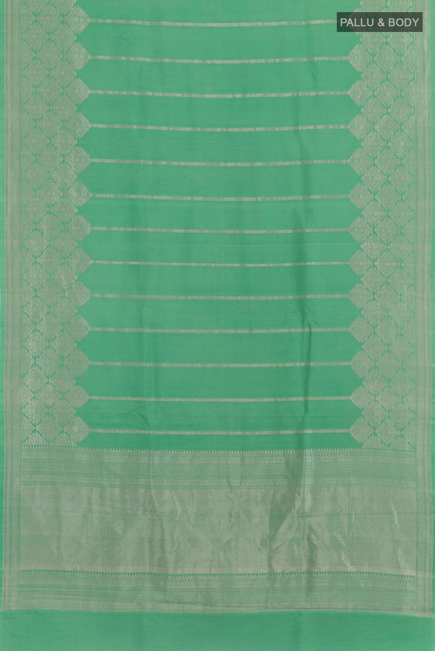 Flat view of Sea Green Banarasi Silk Saree with Stripes on the body and Zari Border. 