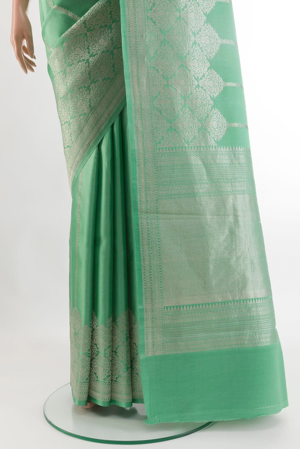 Pleats and pallu of Sea Green Banarasi Silk Saree with Stripes on the body and Zari Border. 