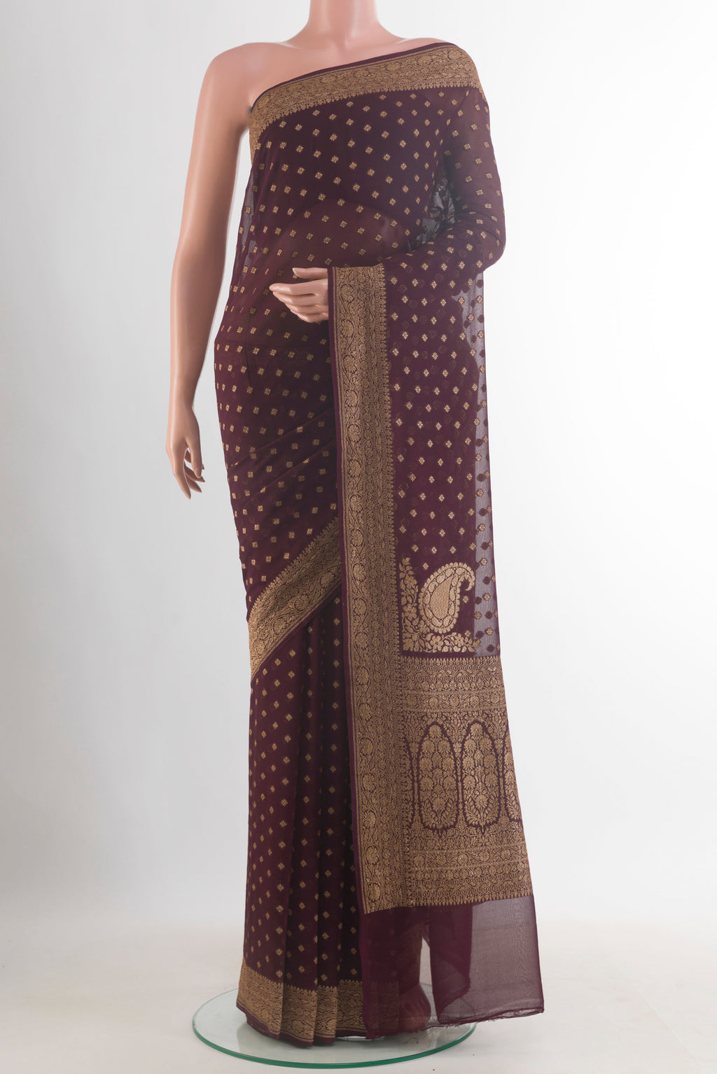 Brown Banarasi Georgette Saree with Zari Butta on the body and Zari Border.  displayed on a mannequin