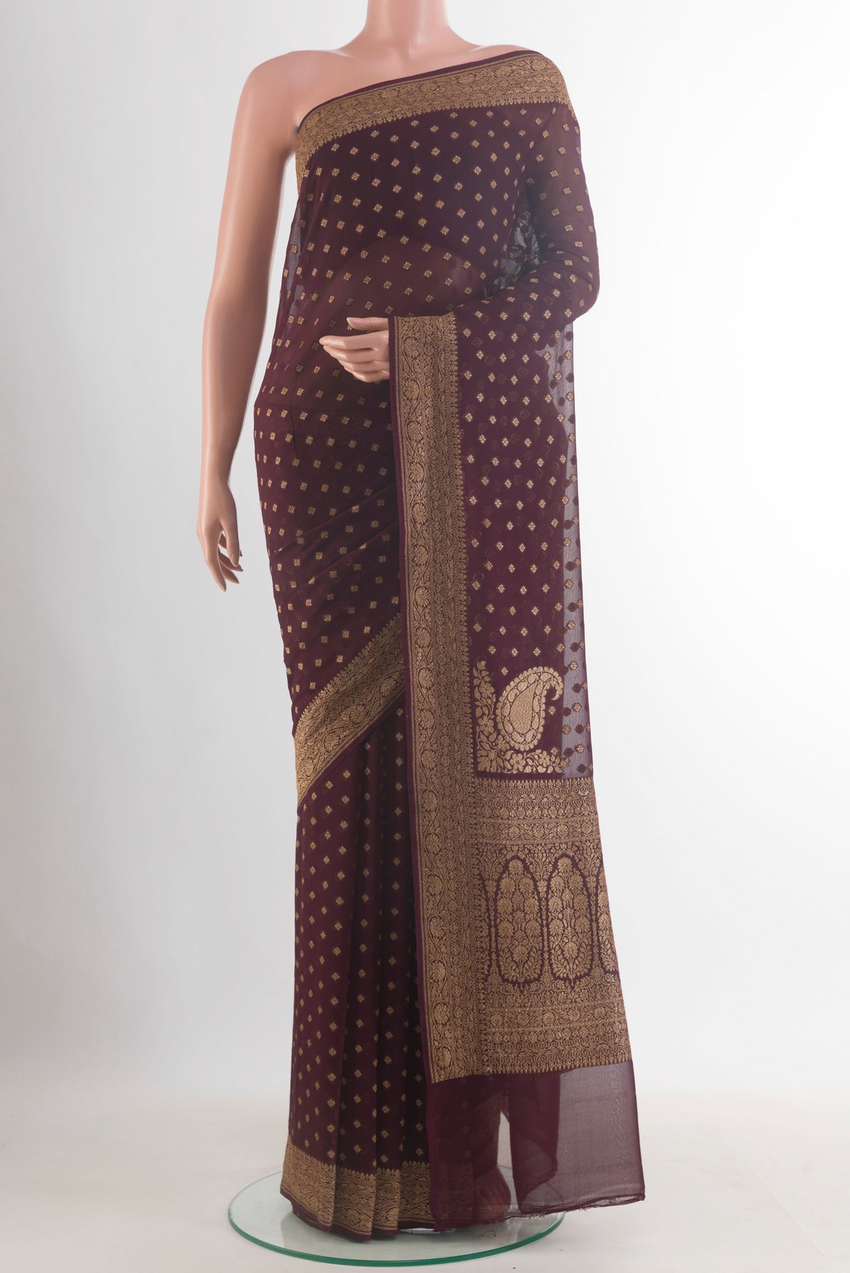 Brown Banarasi Georgette Saree with Zari Butta on the body and Zari Border.  displayed on a mannequin