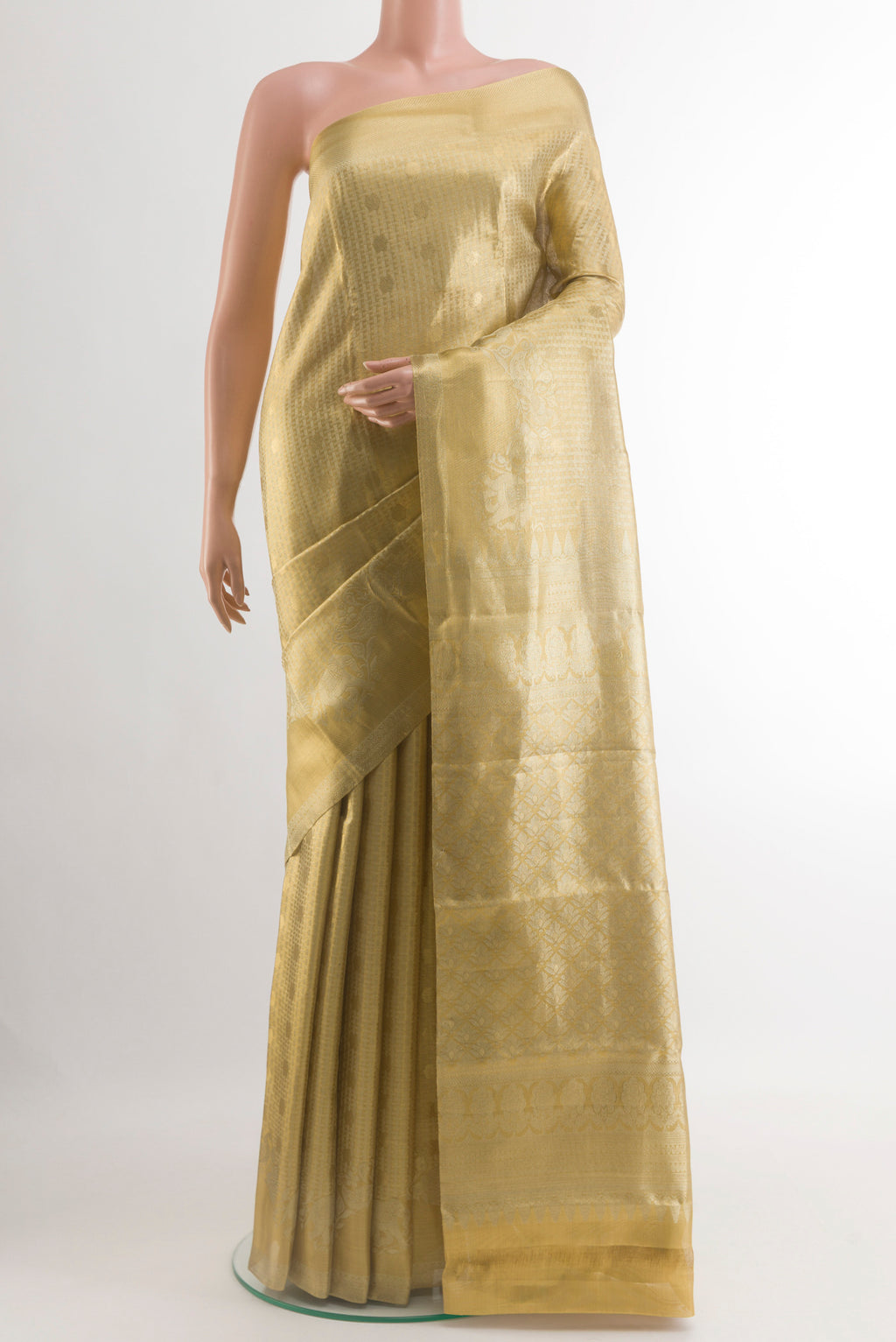 Golden Kanjivaram Tissue Silk Saree with Zari Brocade on the body and Zari Border.  displayed on a mannequin