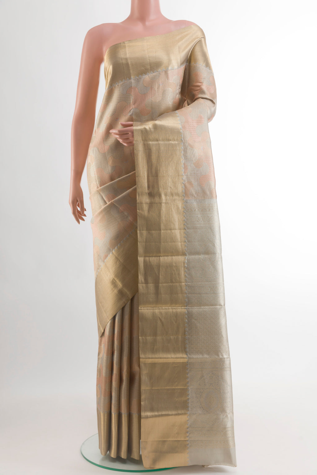 Multi Color Kanjivaram Tissue Silk Saree with Zari Brocade on the body and Zari Border.  displayed on a mannequin