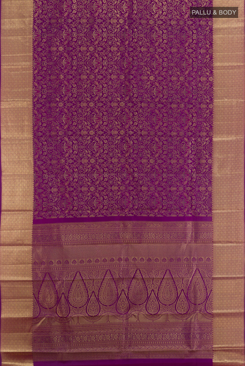 Flat view of Purple Kanchipuram Silk Saree with Zari Brocade on the body and Zari Border. 