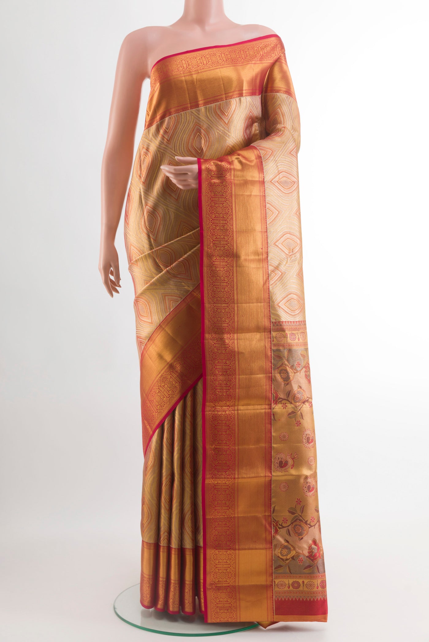 Golden Dual Tone Kanchipuram Tissue Silk Saree with Zari Brocade on the body and Zari Border.  displayed on a mannequin