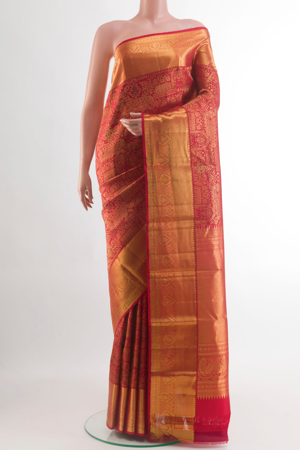 Red Kanjivaram Silk Saree with Zari Brocade on the body and Zari Border.  displayed on a mannequin
