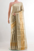 Silver Kanjivaram Tissue Silk Saree with Zari Brocade on the body and Zari Border.  displayed on a mannequin